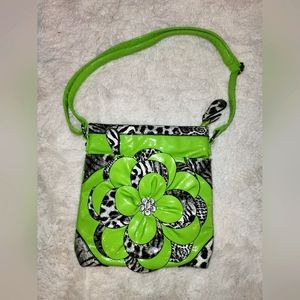 GREEN PURSE WITH ZEVRA AND FORAL PRINT